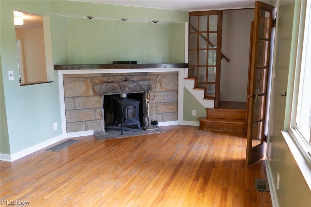 6065 Hopkins Road Mentor, OH 44060 - Photo 12 of 29 Wood burning stove and beautiful wood floors throughout the home