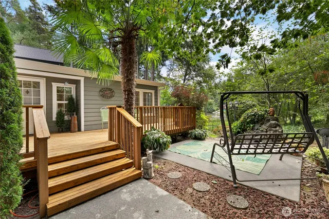 a view of balcony with furniture