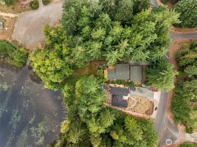 a view of a lake with a yard