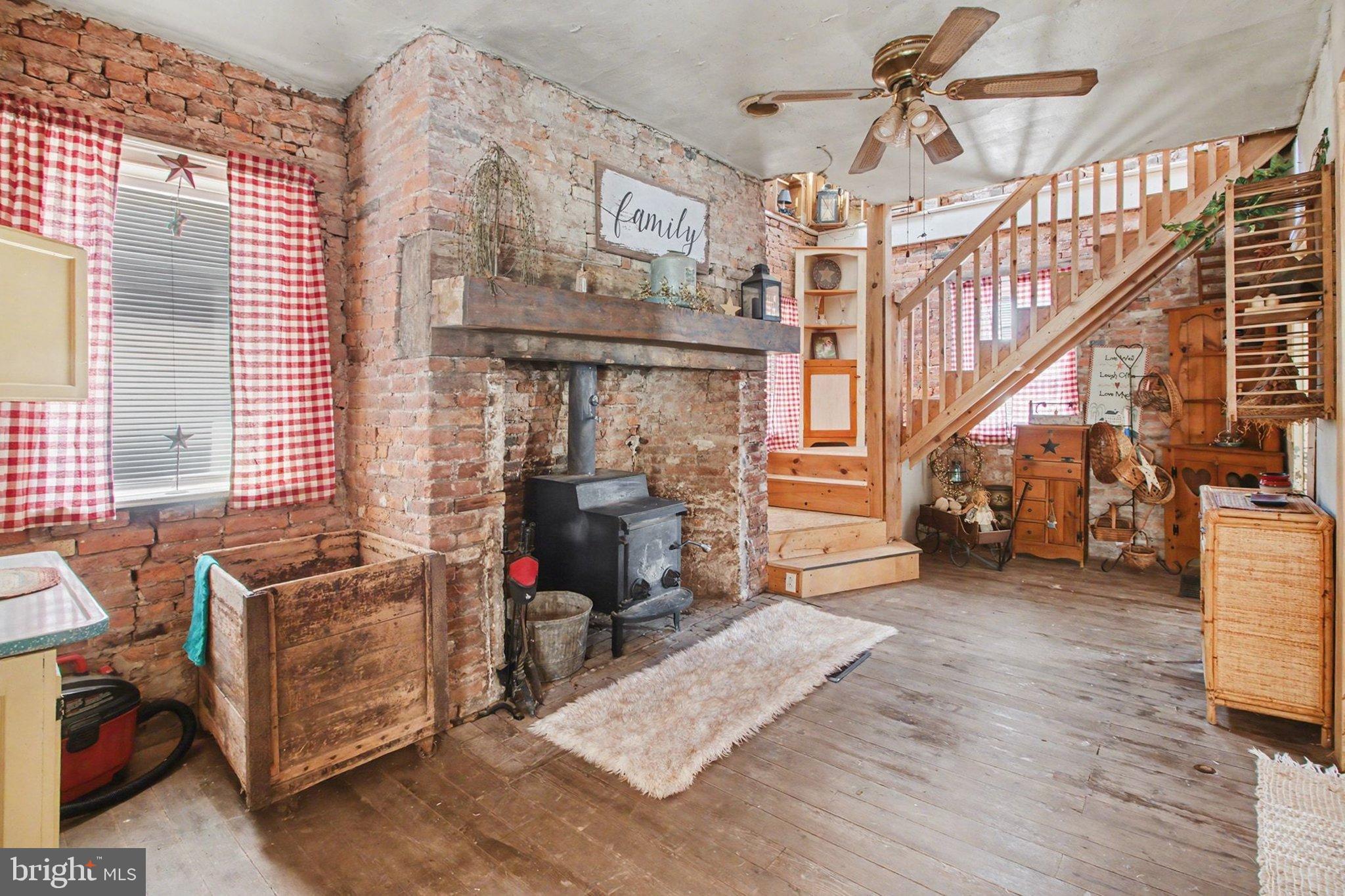 84 Kennedy Valley Road Landisburg, PA 17040 - Photo 12 of 31 Charming rustic living space with warm accents.
