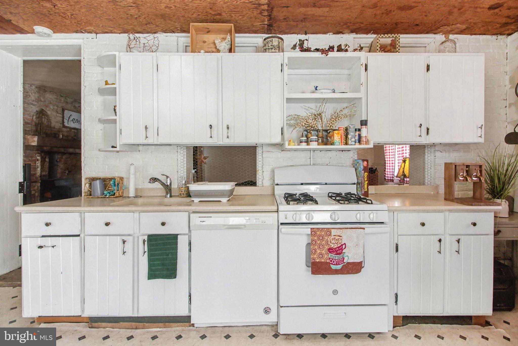 84 Kennedy Valley Road Landisburg, PA 17040 - Photo 6 of 31 Charming white cabinetry in a cozy kitchen.