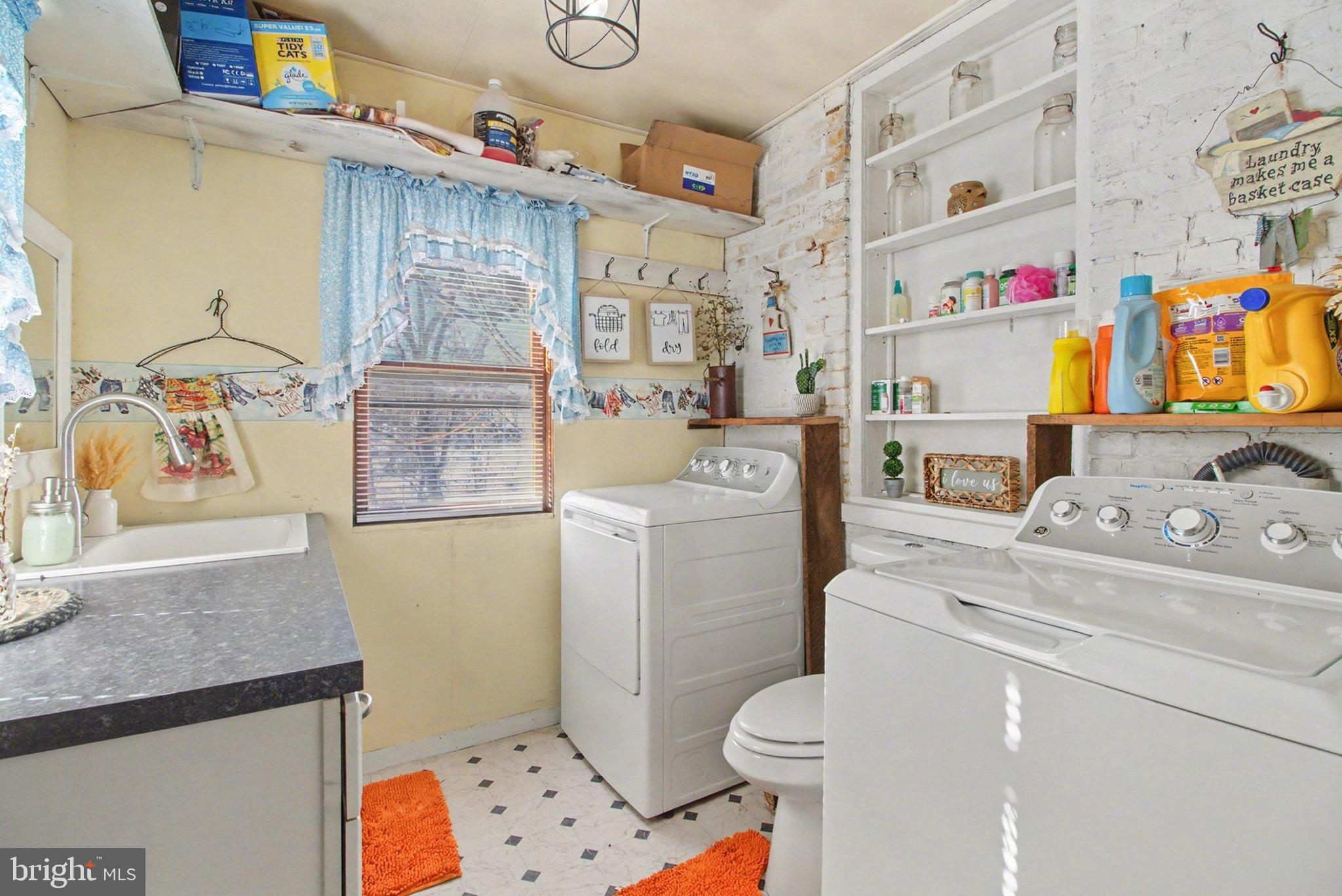 84 Kennedy Valley Road Landisburg, PA 17040 - Photo 8 of 31 Bright and cheerful laundry space with charm.