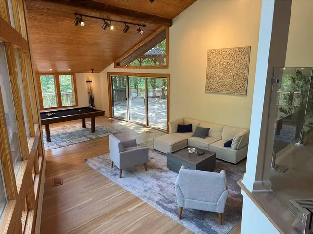 a view of a dining room with furniture window and outside view