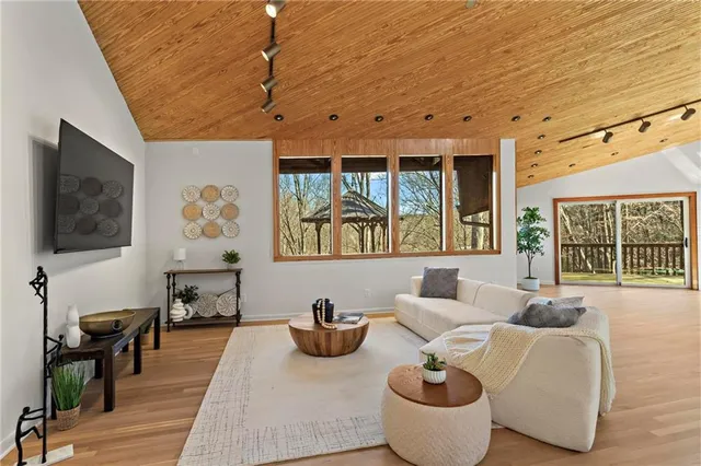 a kitchen with a refrigerator and a sink