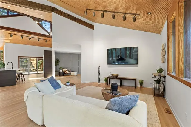 a kitchen with stainless steel appliances granite countertop a stove and a sink