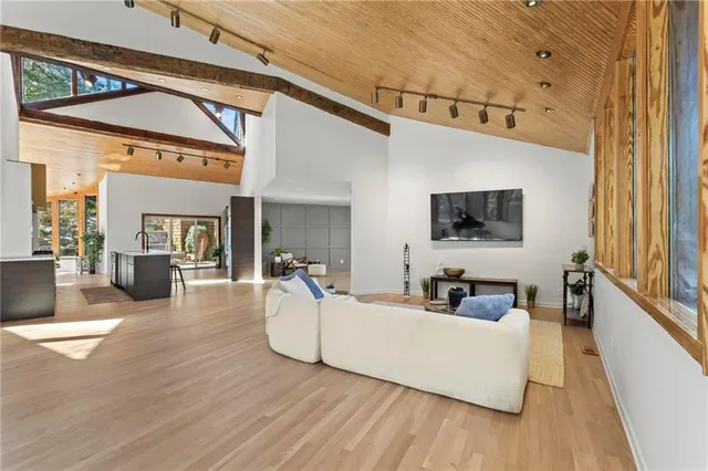 a kitchen with granite countertop a stove and a sink