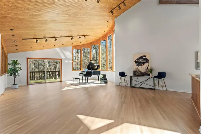 a view of a dining room with furniture window and outside view