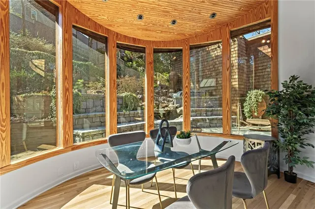 a bathroom with a sink a mirror and a shower