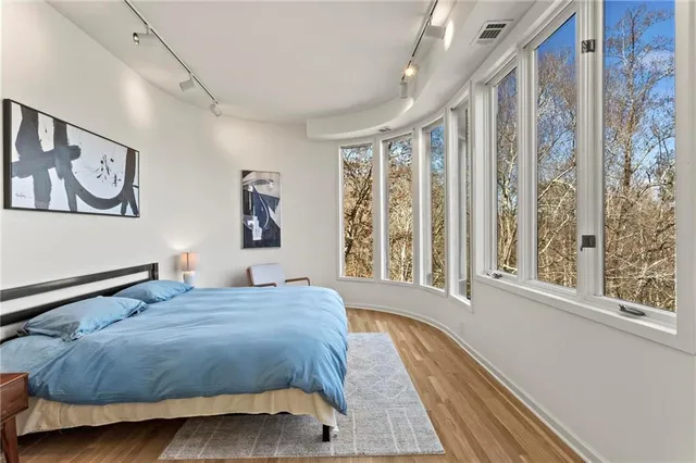 a view of a dining room with furniture and window