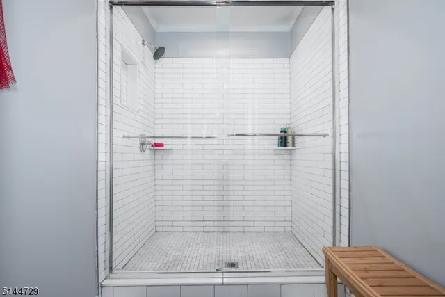 a view of yard with swimming pool and green space