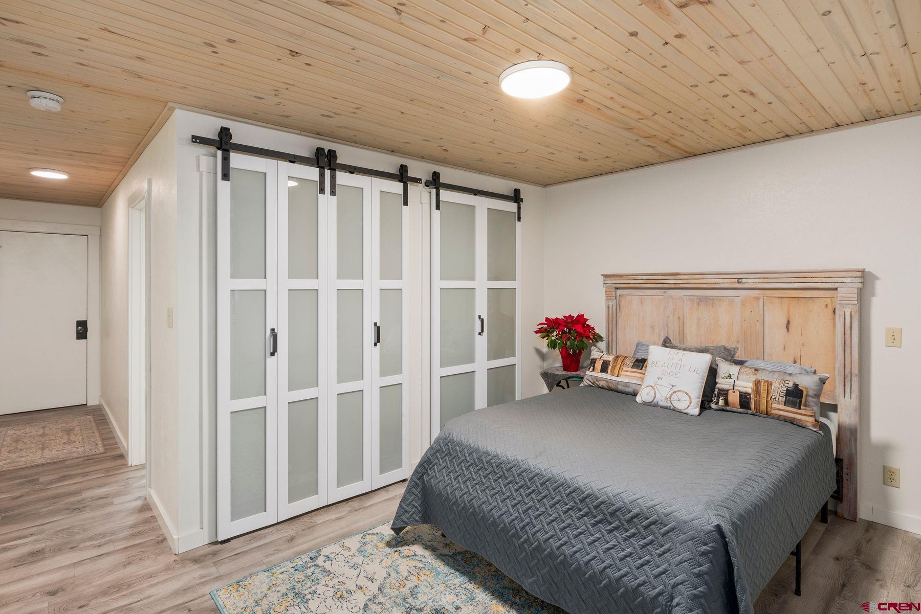 35 Emmons Road, Unit A Crested Butte, CO 81225 - Photo 14 of 28 a bed room with a bed and a window