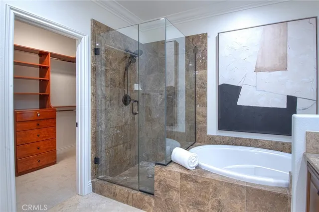 a bathroom with a shower and a bathtub