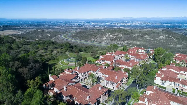 an aerial view of a city with lots of residential buildings