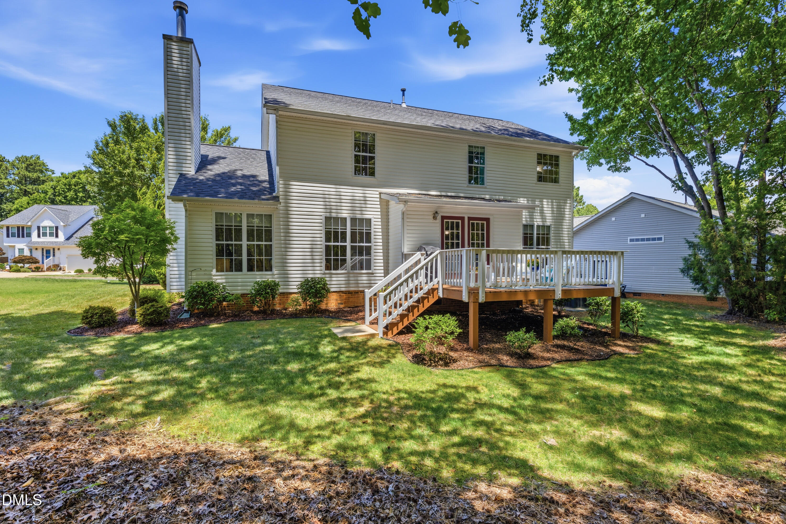 1211 Waterford Green Drive Apex, NC 27502 - Photo 46 of 53 a view of a house with backyard and sitting area