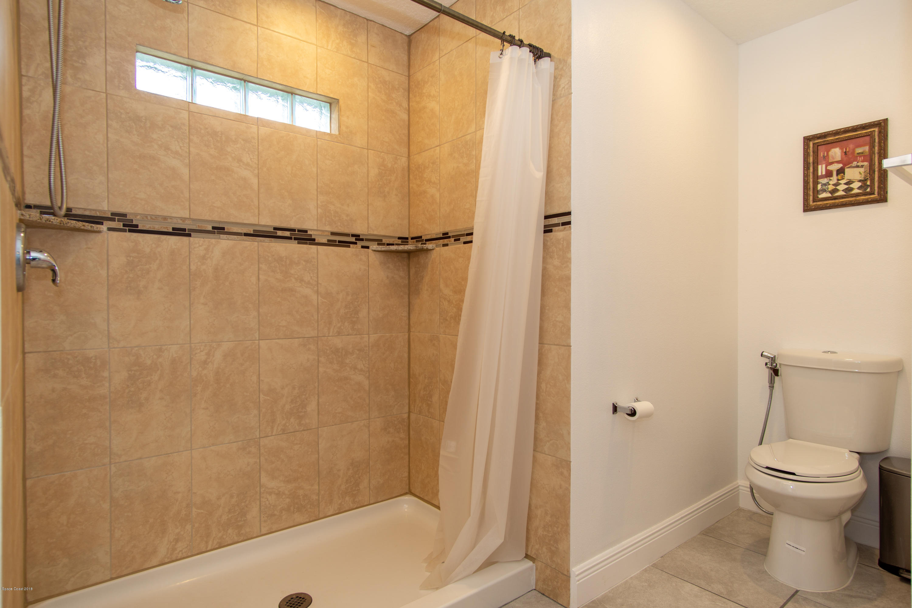 1543 Paragon Road Southeast Palm Bay, FL 32909 - Photo 9 of 18 Master bath shower