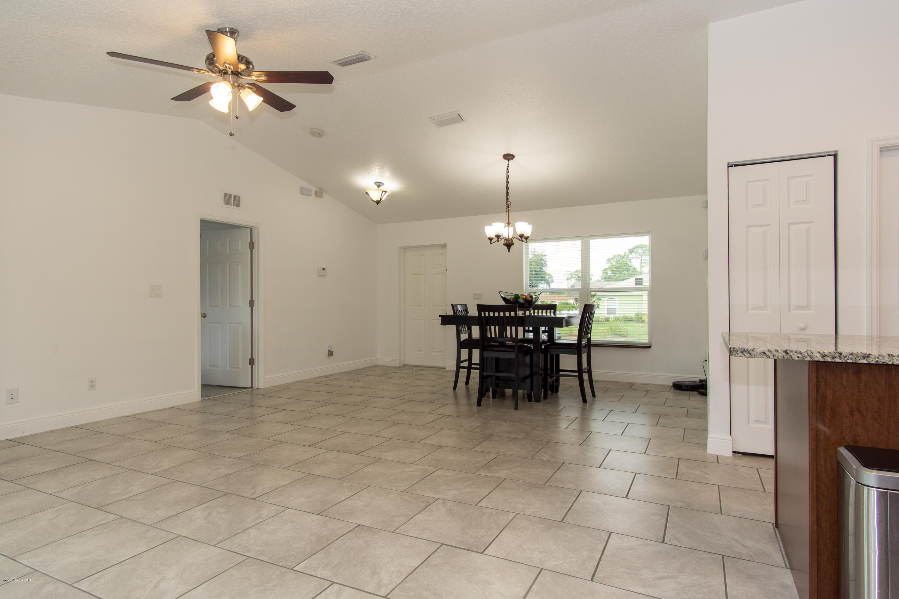 1543 Paragon Road Southeast Palm Bay, FL 32909 - Photo 10 of 18 Formal dining/ Living room