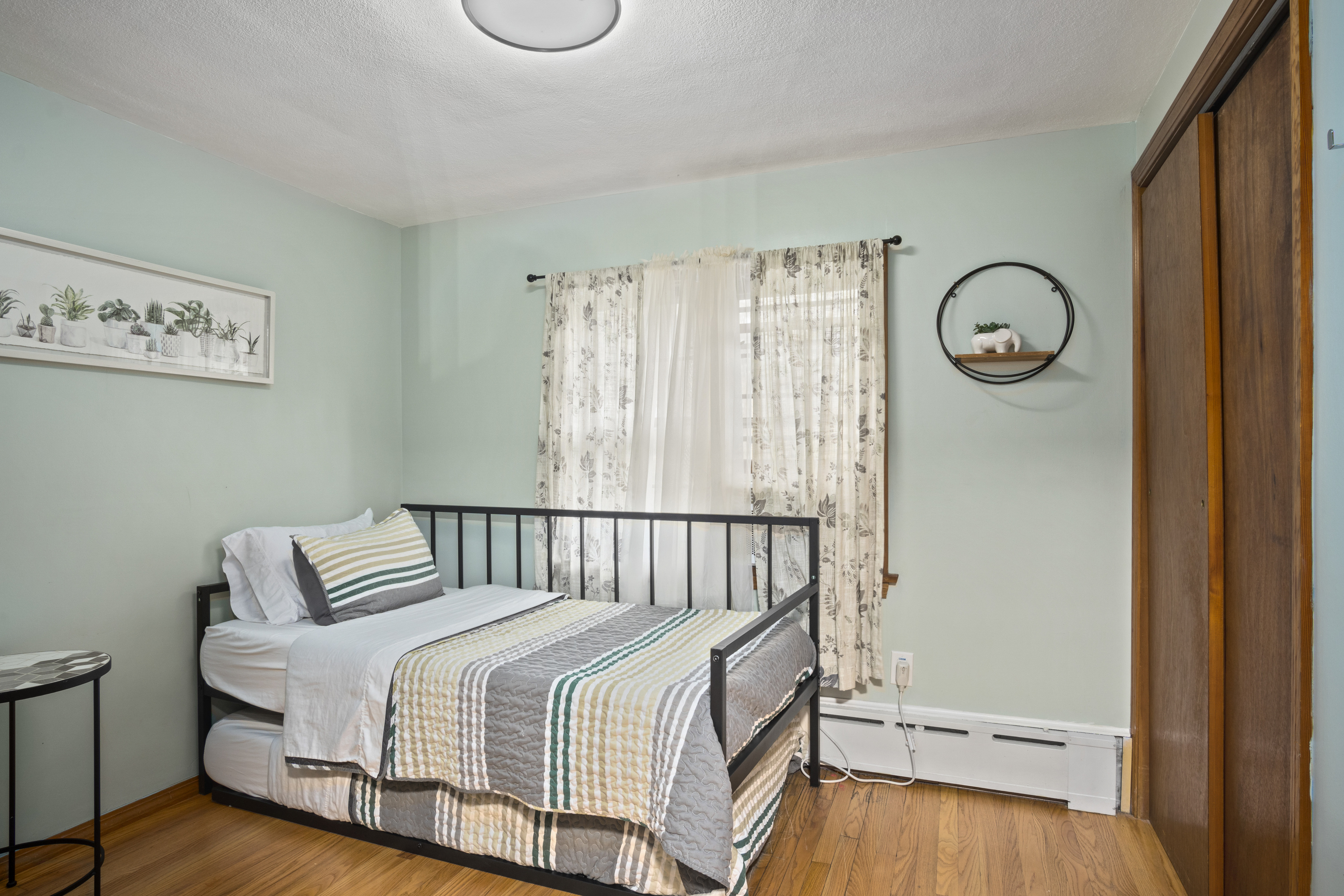 33 Briar Hill Road Norwich, CT 06360 - Photo 13 of 33 a bedroom with a bed and a window