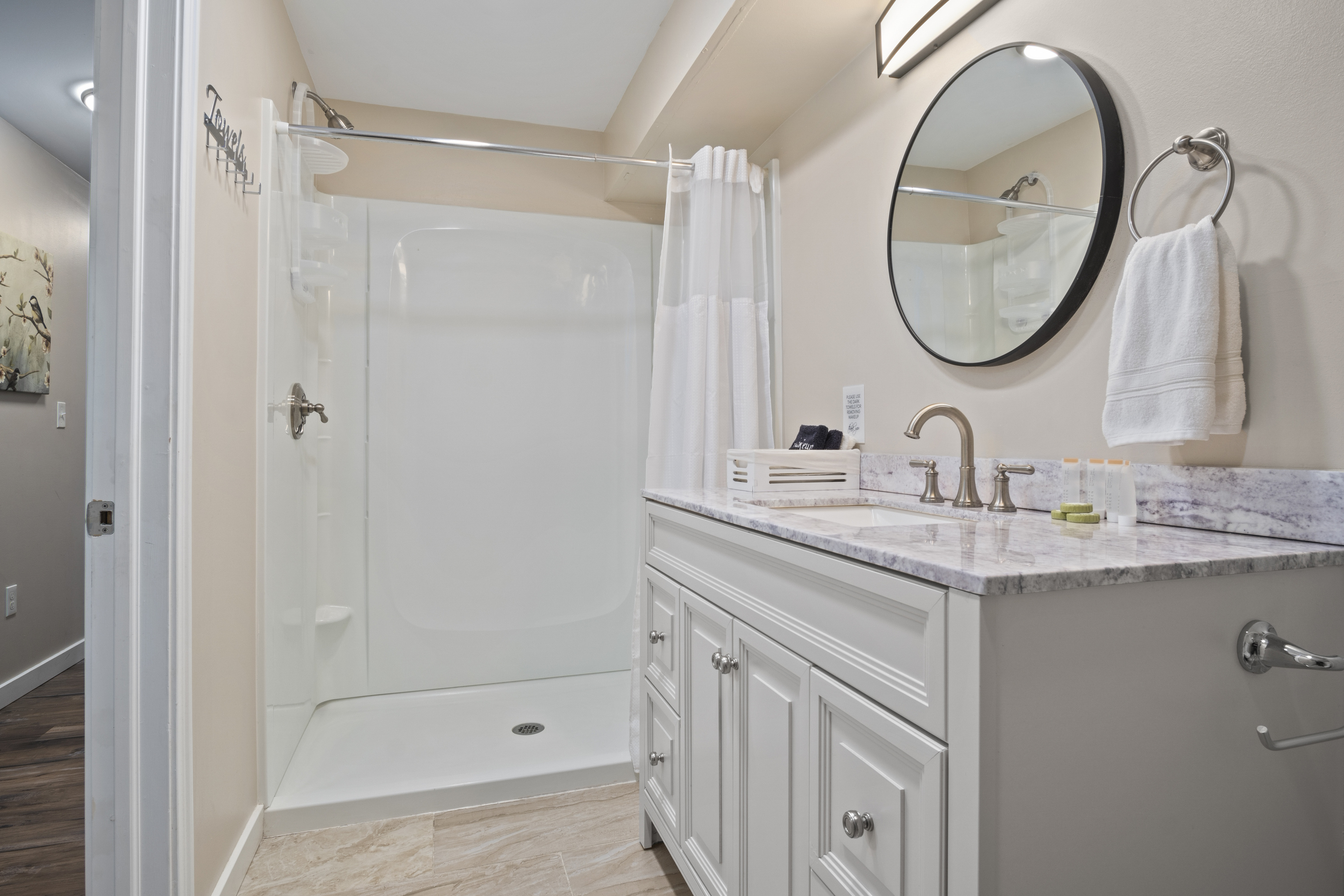 33 Briar Hill Road Norwich, CT 06360 - Photo 16 of 33 a bathroom with a granite countertop sink a mirror and a shower