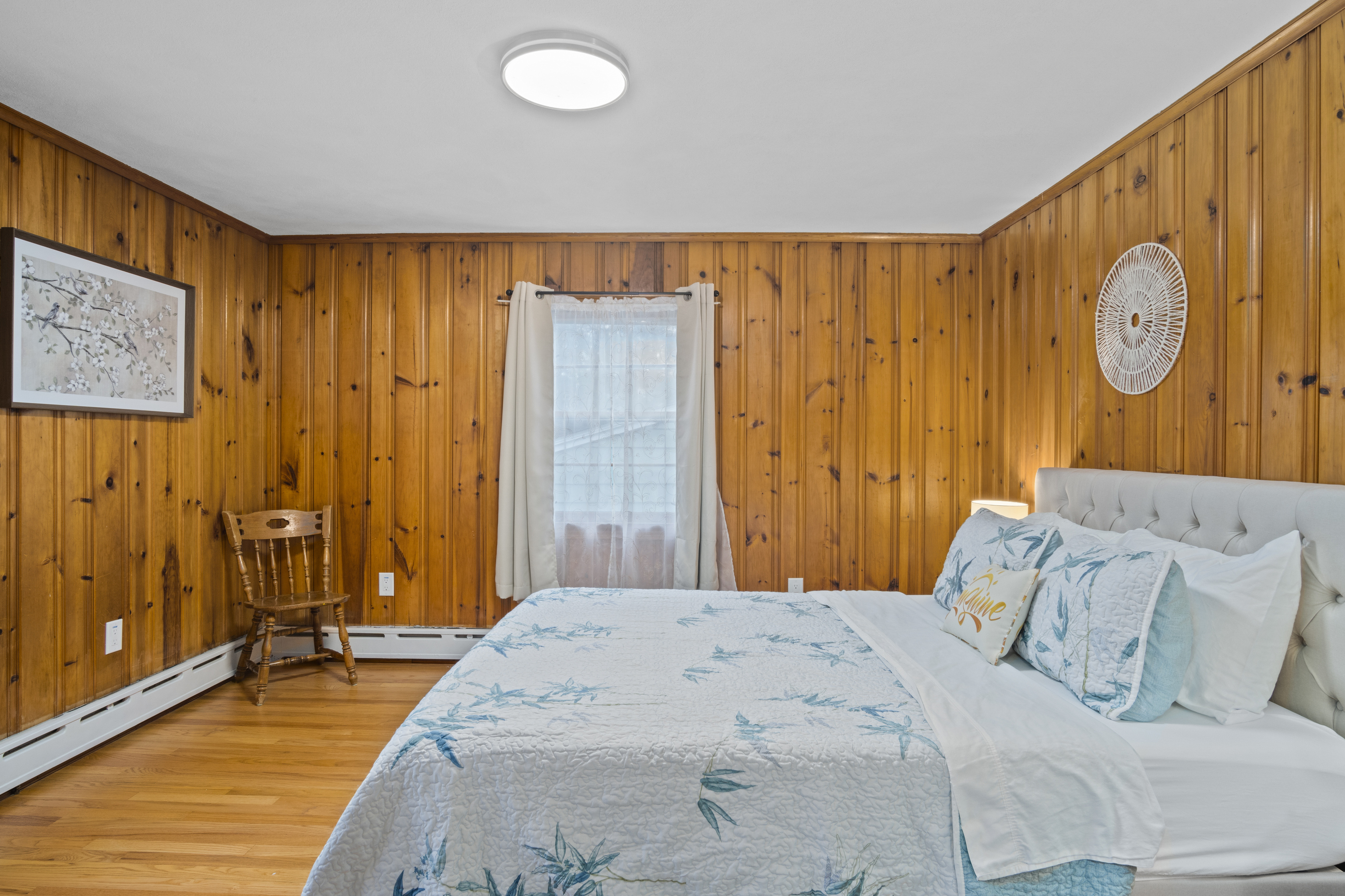33 Briar Hill Road Norwich, CT 06360 - Photo 20 of 33 a bedroom with a bed and wooden floor