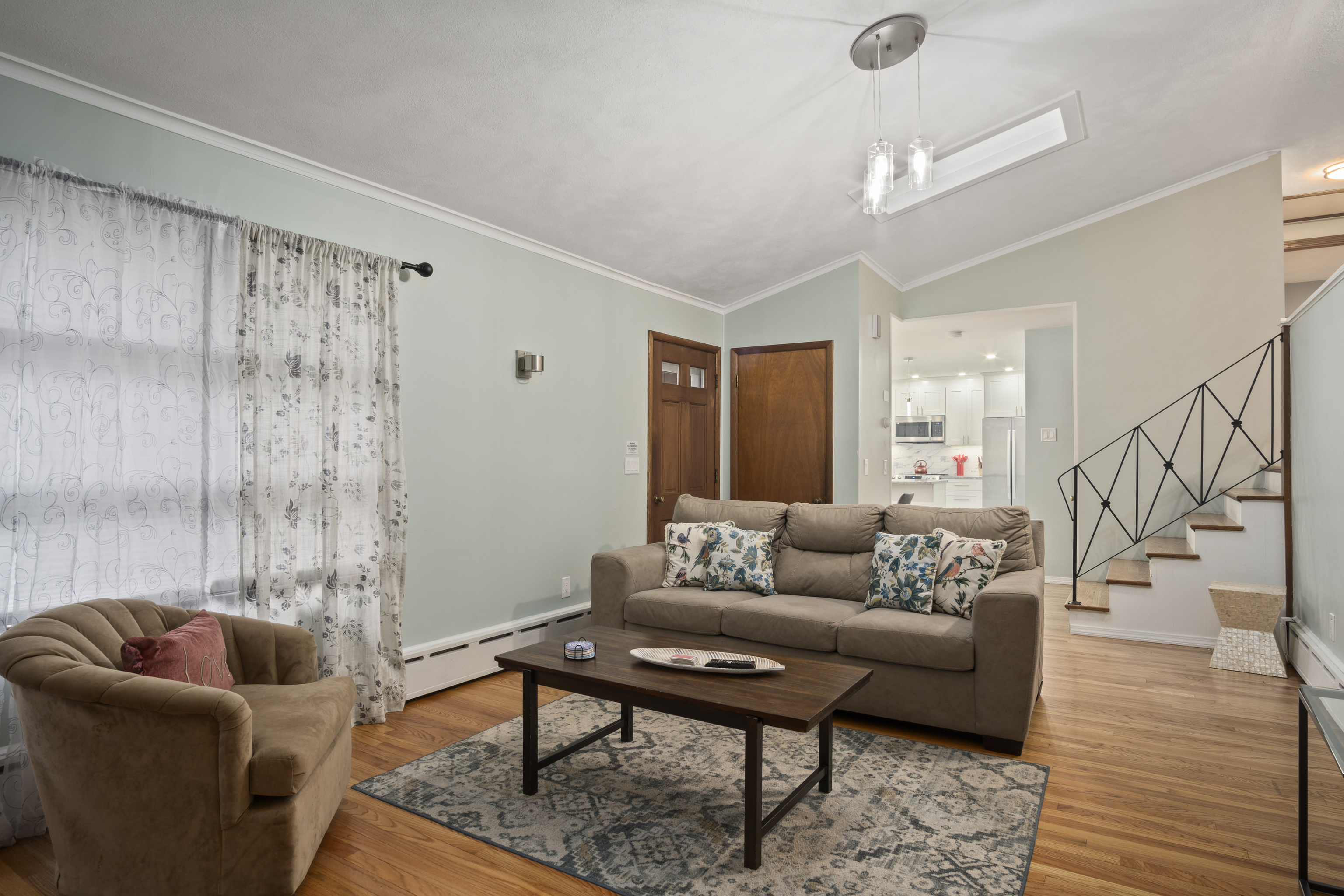 33 Briar Hill Road Norwich, CT 06360 - Photo 4 of 33 a living room with furniture and a rug