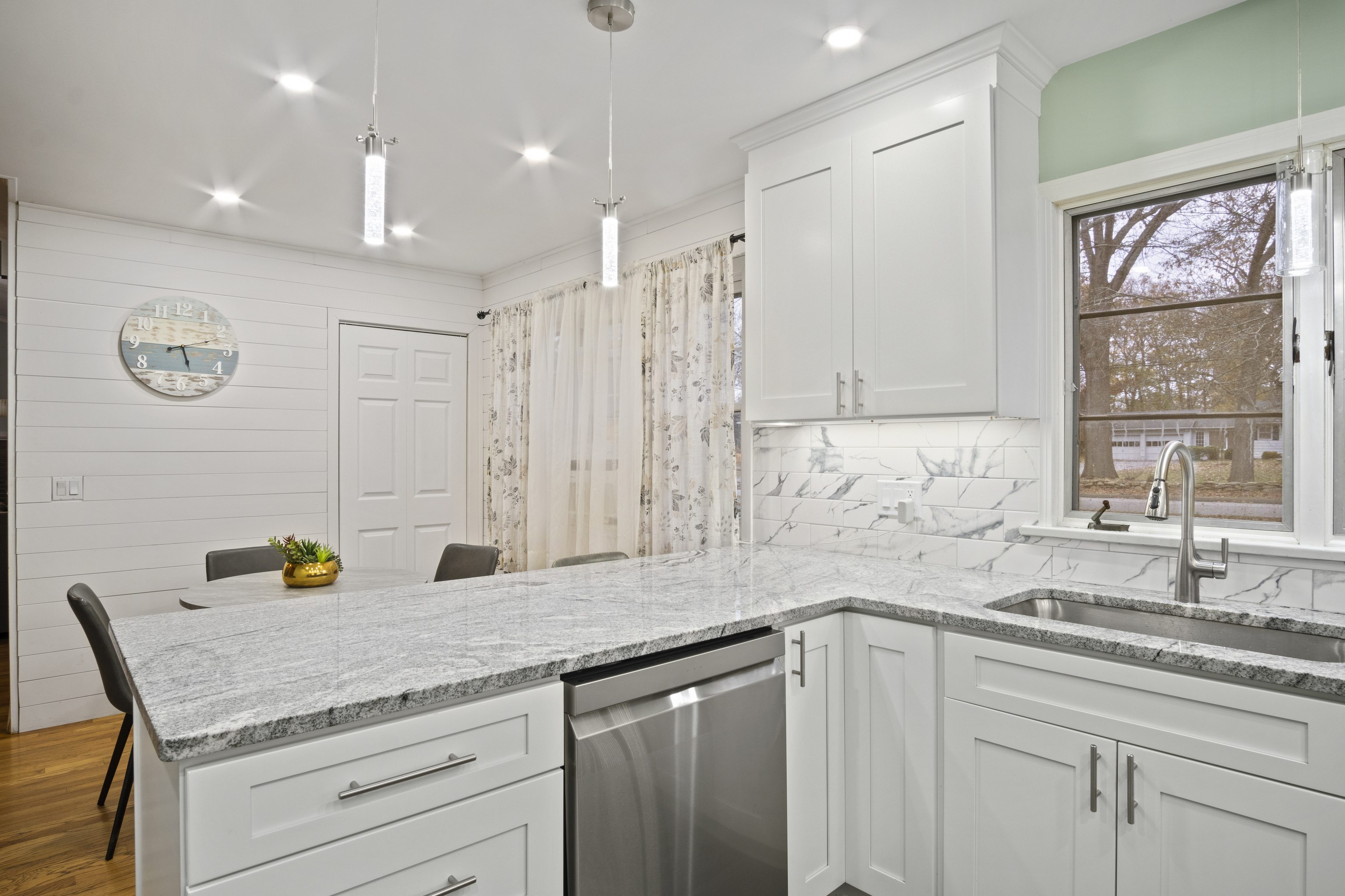 33 Briar Hill Road Norwich, CT 06360 - Photo 7 of 33 a kitchen with a sink window and cabinets