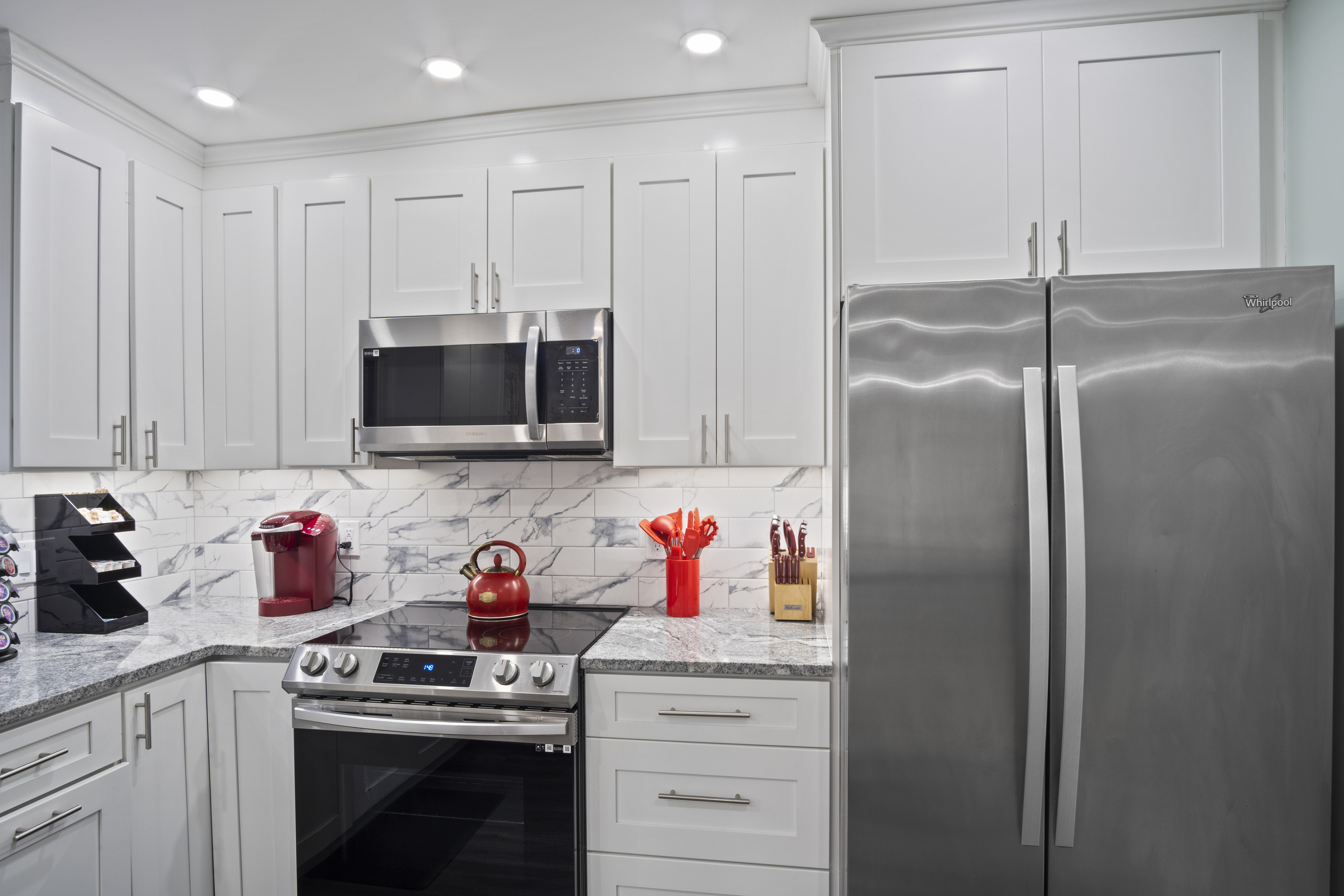 33 Briar Hill Road Norwich, CT 06360 - Photo 8 of 33 a kitchen with stainless steel appliances granite countertop a refrigerator and a sink