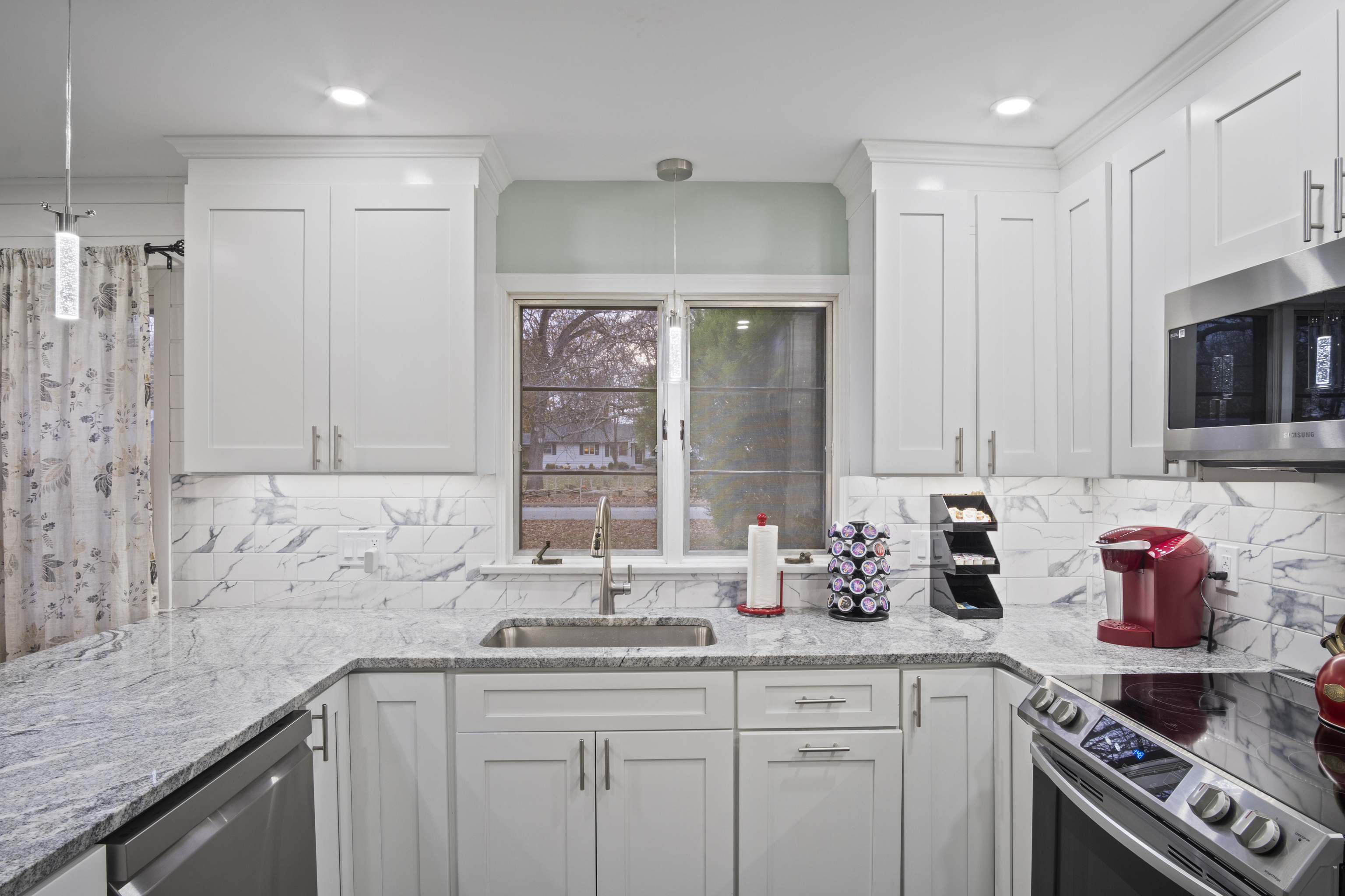 33 Briar Hill Road Norwich, CT 06360 - Photo 9 of 33 a kitchen with stainless steel appliances granite countertop a sink dishwasher a stove and a refrigerator