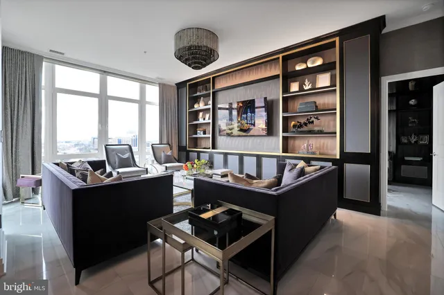 a kitchen with stainless steel appliances granite countertop a stove and a refrigerator