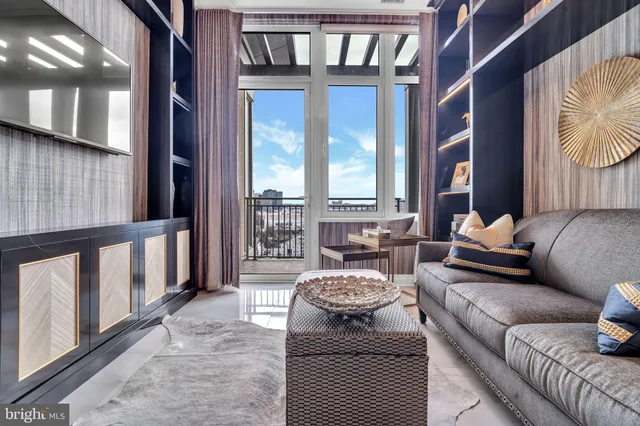 a bedroom with a bed next to a window with outer view