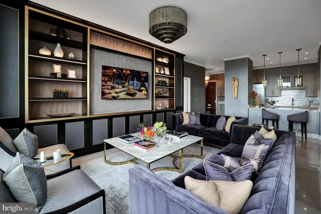 a kitchen with refrigerator and chair