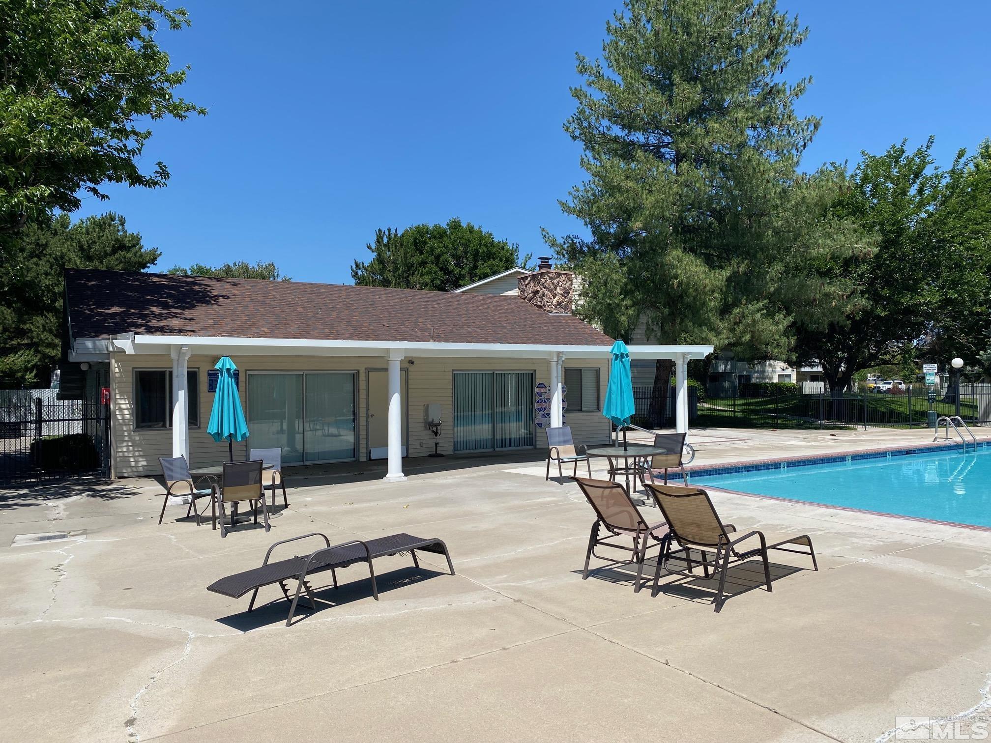 1533 Delucchi Lane Reno, NV 89502 - Photo 15 of 21 a view of a patio with a table and chairs