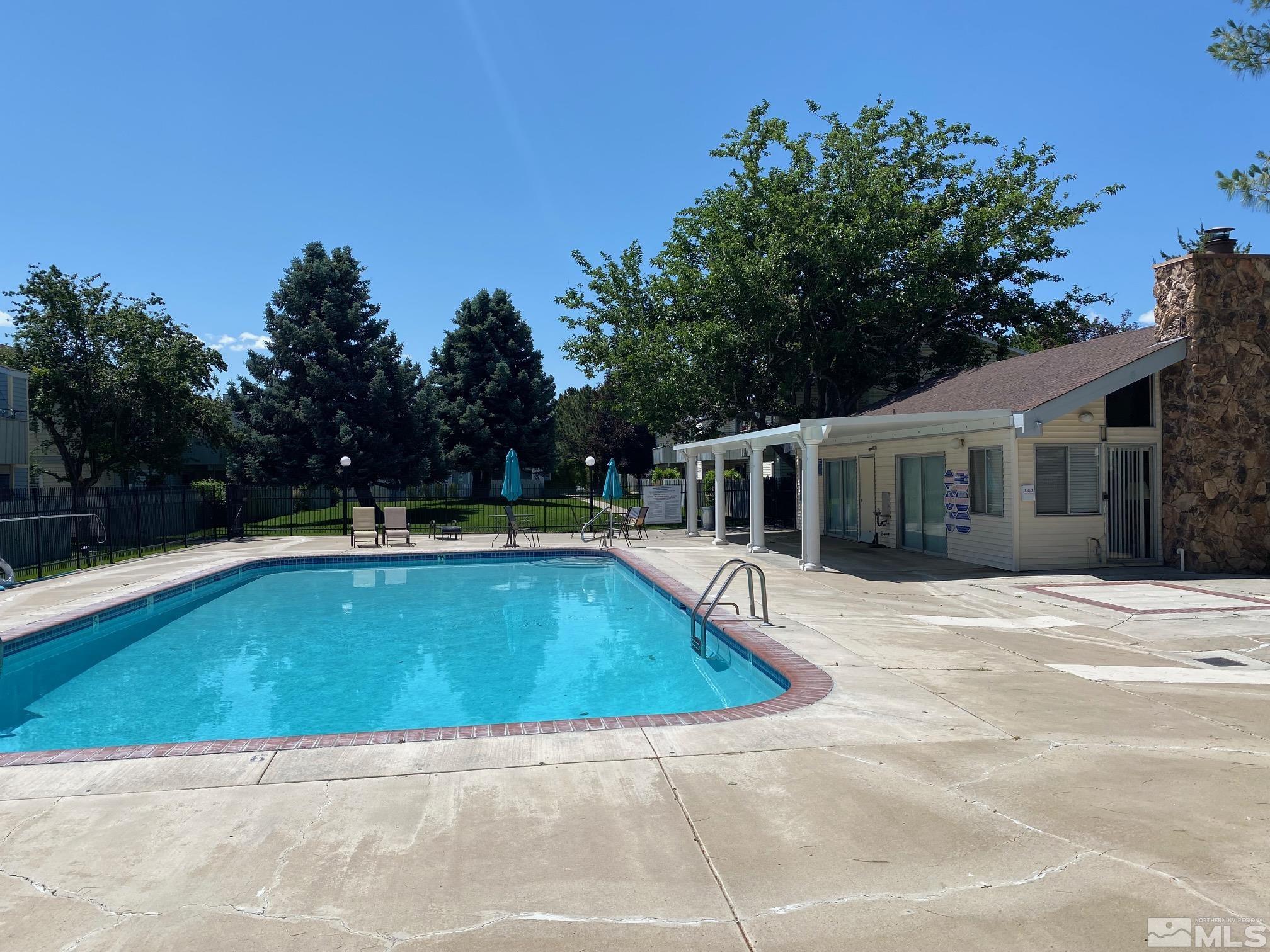 1533 Delucchi Lane Reno, NV 89502 - Photo 17 of 21 a view of a house with pool
