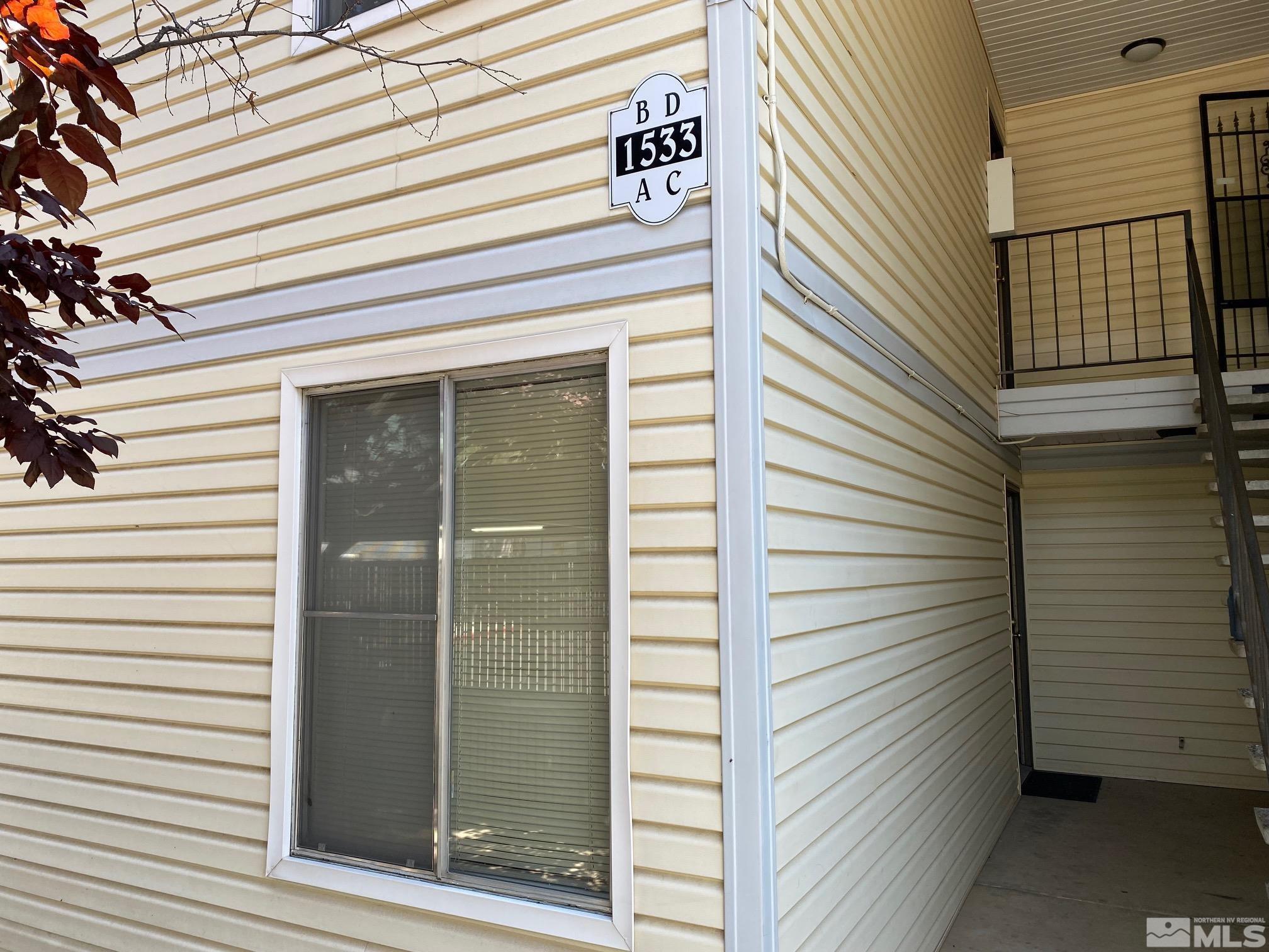 1533 Delucchi Lane Reno, NV 89502 - Photo 2 of 21 a view of a door and a window