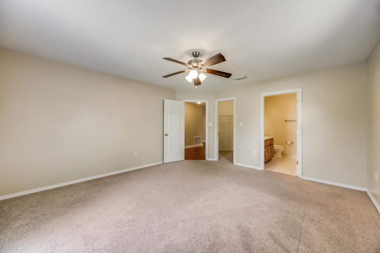 2808 Ping Lane Crestview, FL 32539 - Photo 26 of 33 a view of an empty room with a ceiling fan