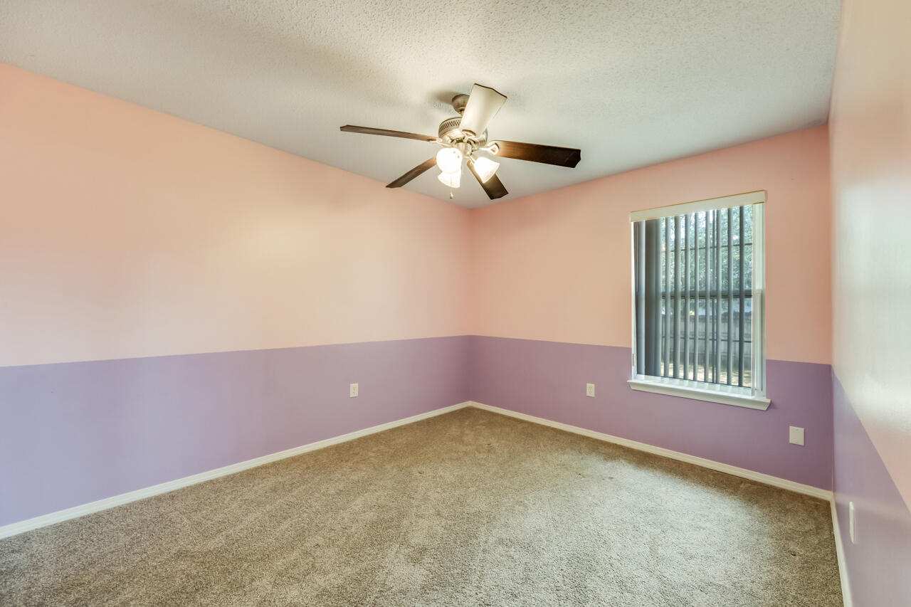 2808 Ping Lane Crestview, FL 32539 - Photo 30 of 33 a view of an empty room with a window