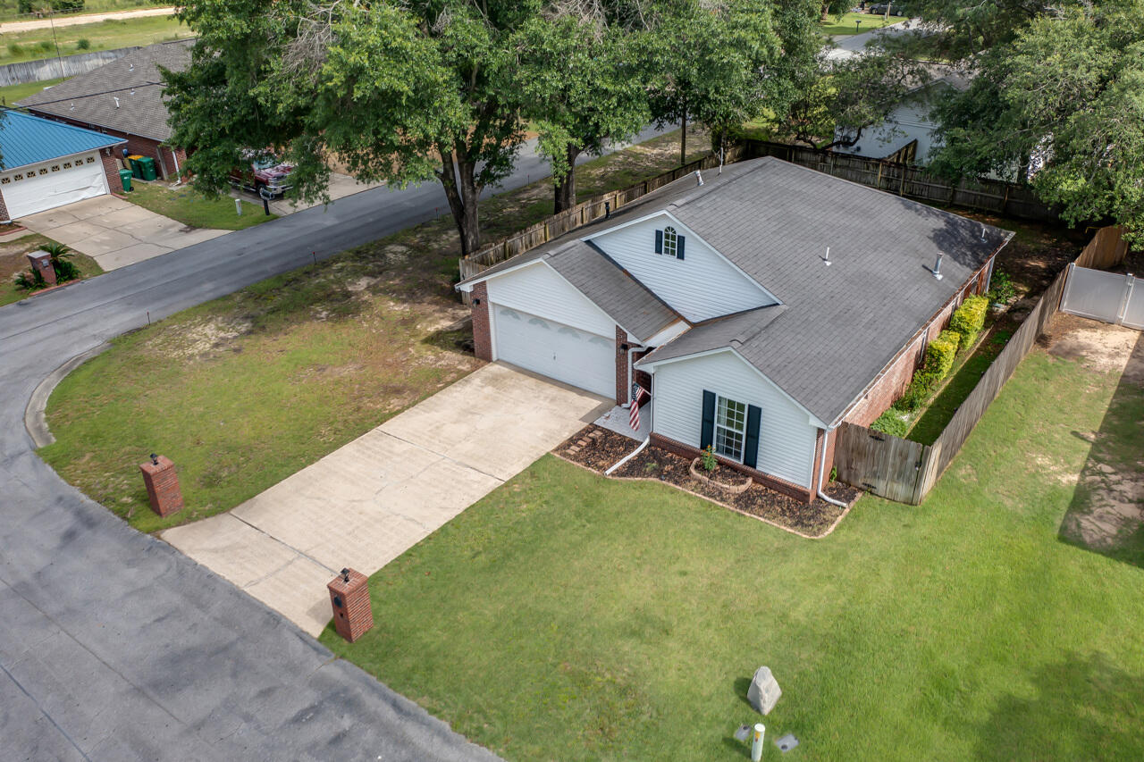 2808 Ping Lane Crestview, FL 32539 - Photo 3 of 33 an aerial view of a house with swimming pool