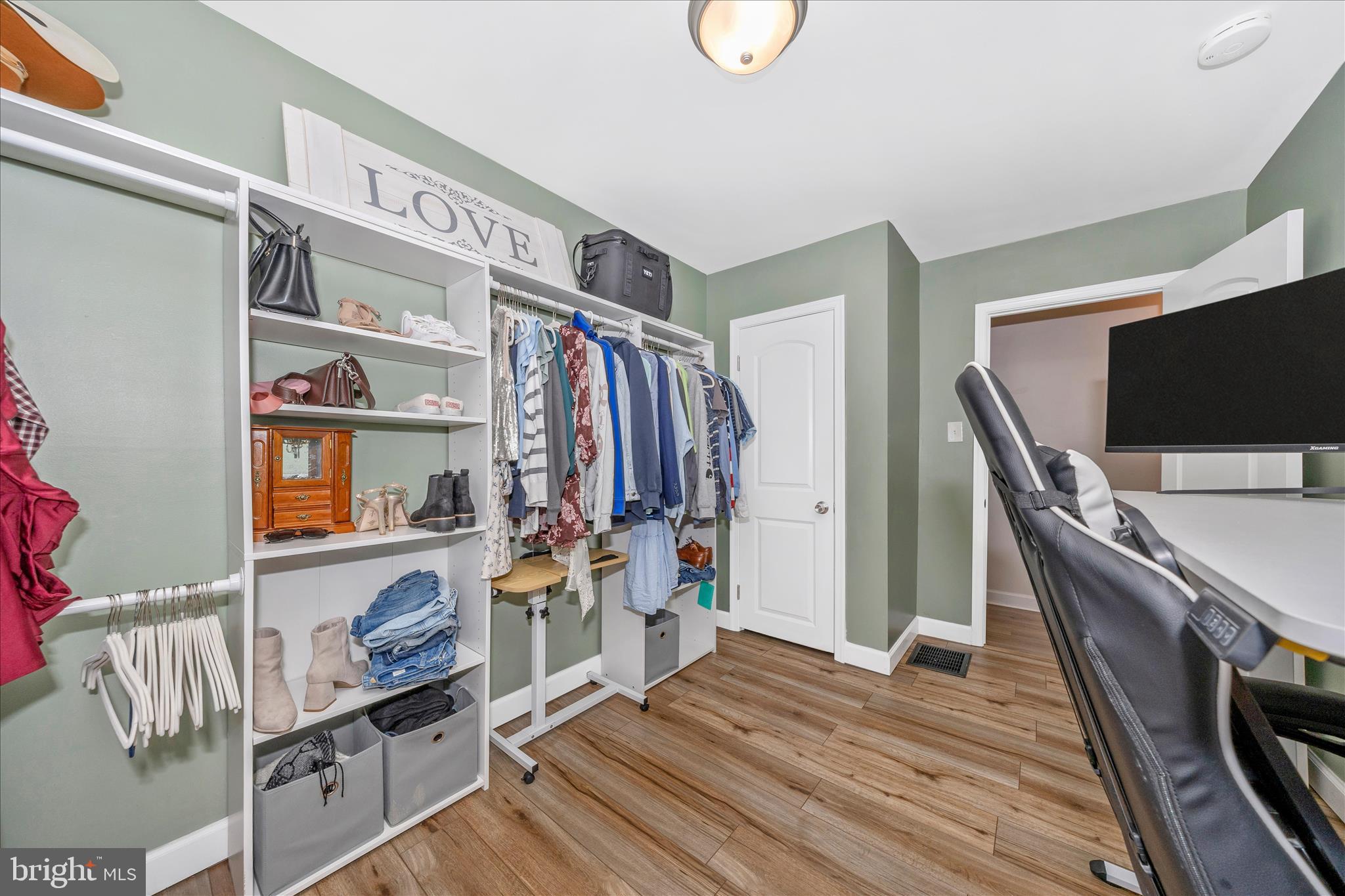 11863 Wolfsville Road Smithsburg, MD 21783 - Photo 19 of 51 a view of an empty room with furniture and wooden floor