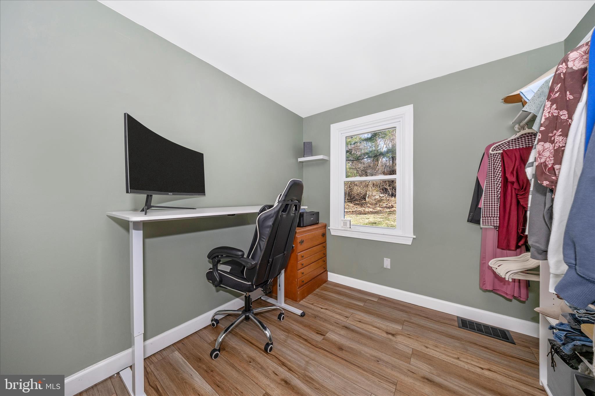 11863 Wolfsville Road Smithsburg, MD 21783 - Photo 21 of 51 a view of a workspace with furniture and a window