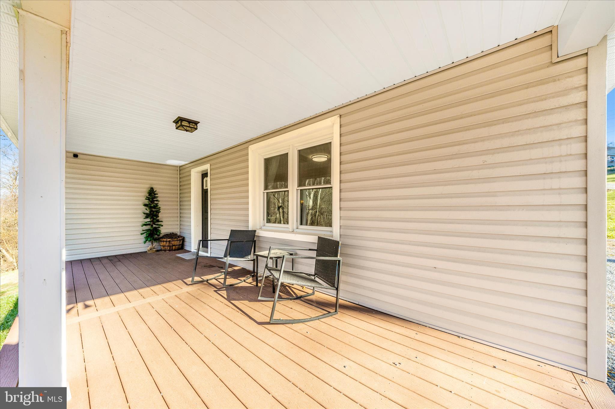 11863 Wolfsville Road Smithsburg, MD 21783 - Photo 43 of 51 a view of a house with patio