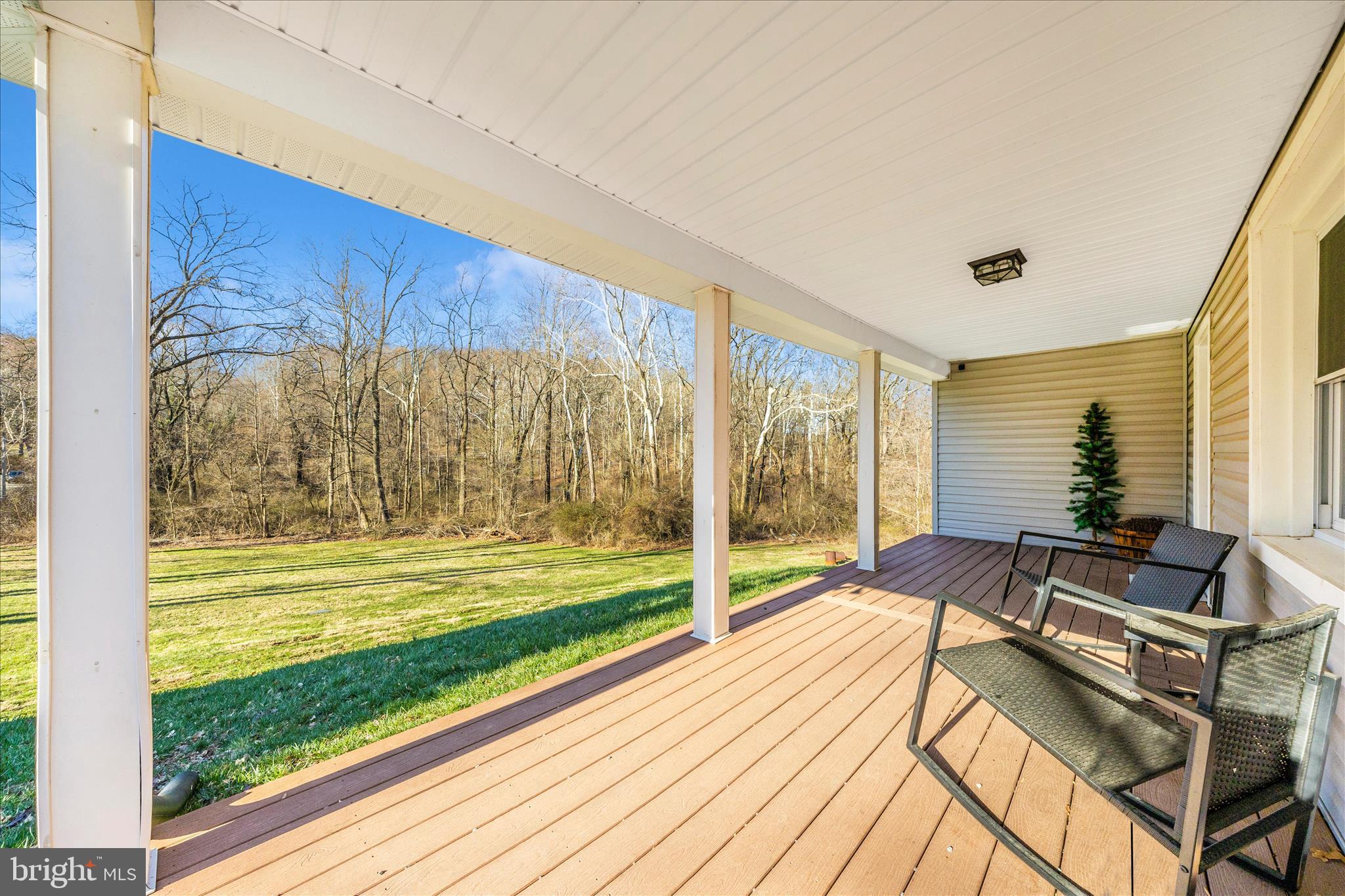 11863 Wolfsville Road Smithsburg, MD 21783 - Photo 44 of 51 a spacious bedroom with a bed and wooden floor