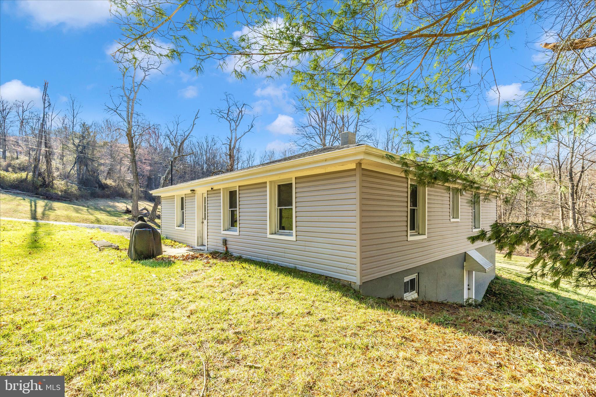 11863 Wolfsville Road Smithsburg, MD 21783 - Photo 46 of 51 a view of a house with a yard