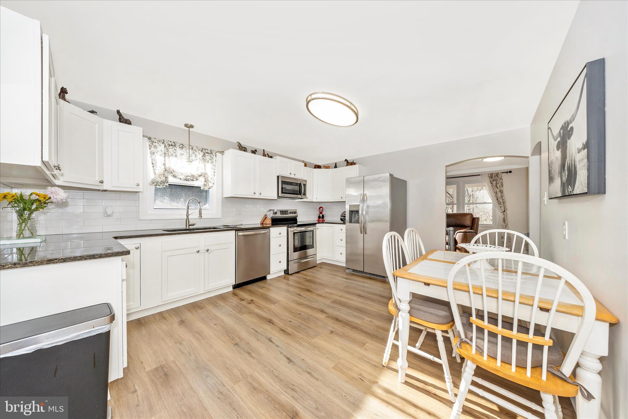 11863 Wolfsville Road Smithsburg, MD 21783 - Photo 10 of 51 a kitchen with cabinets a sink and appliances