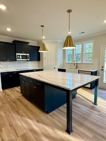 $628,000 | 5604 Penguin Drive, Summerfield, NC 27358