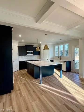 $628,000 | 5604 Penguin Drive, Summerfield, NC 27358