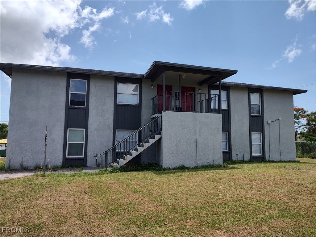 16930 Juanita Avenue Fort Myers, FL 33908 - Photo 1 of 6 a view of a backyard