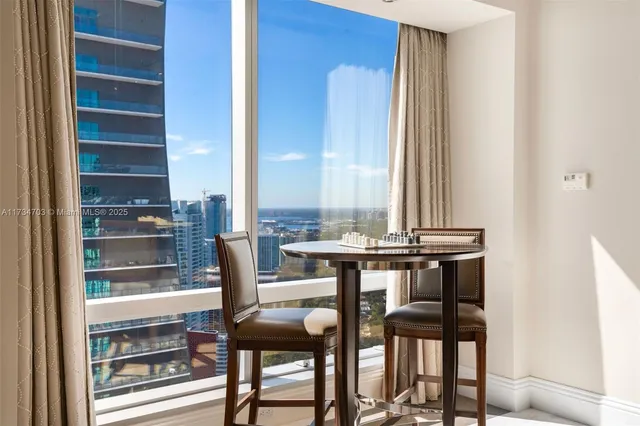 a view of a dining room with chairs