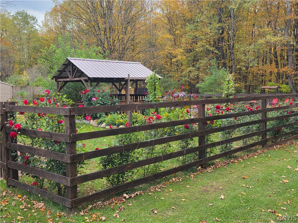1053 Grant Road Russia, NY 13324 - Photo 26 of 47 Lush plantings and a covered pavilion are enclosed