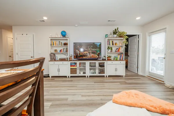 a kitchen with stainless steel appliances a stove and a cabinets