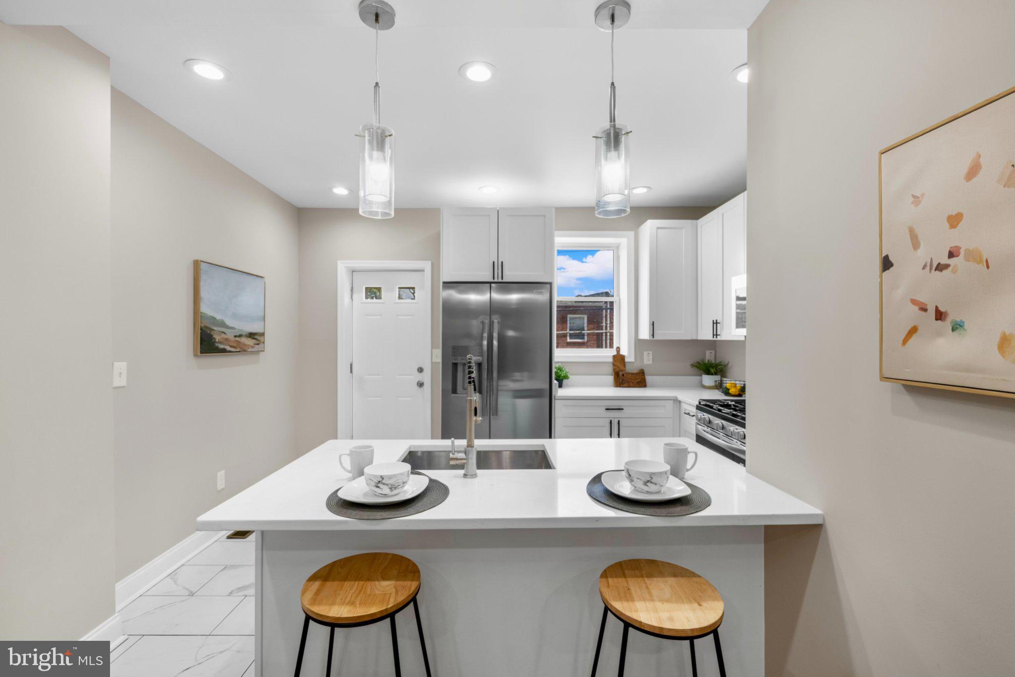 145 North Monastery Avenue Baltimore, MD 21229 - Photo 7 of 45 Modern kitchen with sleek finishes.