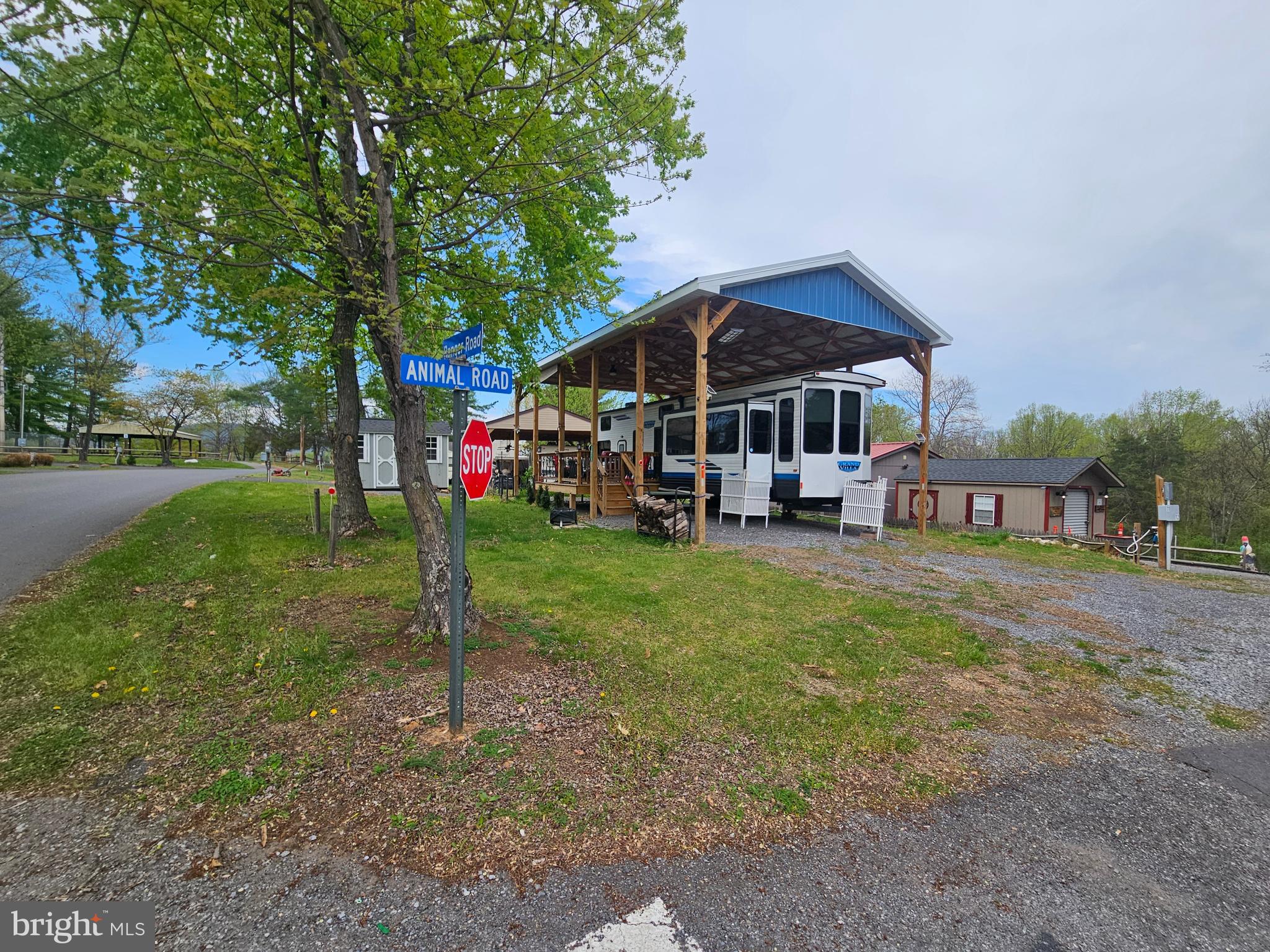 11 Ranger Road Falling Waters, WV 25419 - Photo 2 of 48 a front view of a house with a yard table and chairs